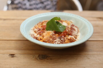 delicious appetizing classic spaghetti pasta with tomato sauce, parmesan