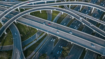 Top up aerial drone view of elevated road and traffic junctions in Chinese metropolis city Chengdu...
