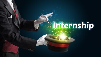 Magician is showing magic trick with Internship inscription, educational concept