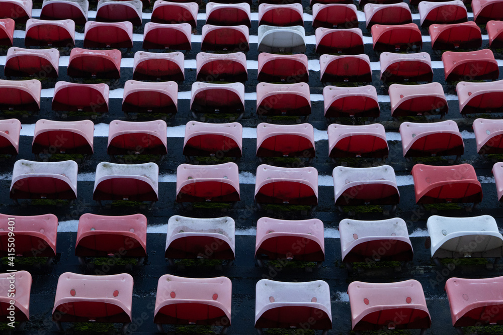 Poster top view of old empty red bleachers in a stadium