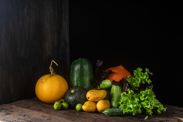 A variety of seasoned vegetables on a dark background
