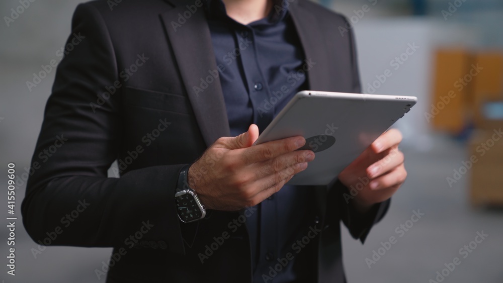 Poster factory manager using tablet computer in warehouse or factory . industry and supply chain management