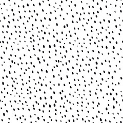 Speckled seamless pattern in the style of hand-drawn graphics