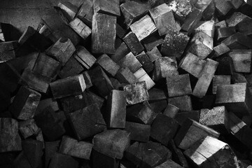 Woodpile in black and white.