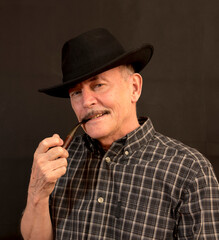 Cowboy in hat with Pipe