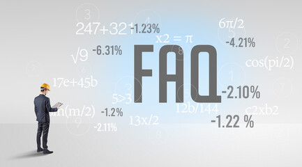 Technology Engineer in hard hat with FAQ abbreviation