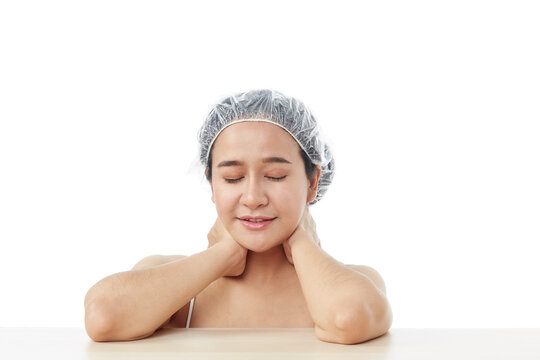 Beauty Spa Woman with perfect skin Portrait. beautiful brunette attractive mixed race Asian female model wearing bath cap
