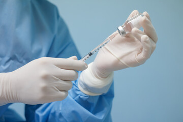 shot of scientist doctor holding a bottle vaccine. Vaccination is one of the most effective ways to...