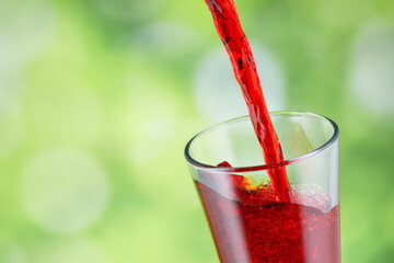 juice pouring into glass