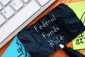  Financial concept about Federal Funds Rate with phrase on the page.