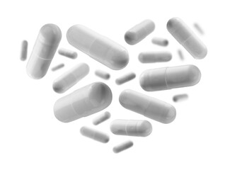 Capsules with the drug in the shape of a heart on a white background