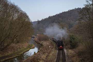 Steam Train Moving Through The Countryside