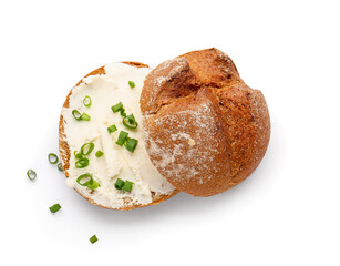 Fresh bun with tasty cream cheese on white background