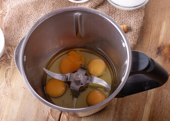 eggs  in mixer  preparing for whipping