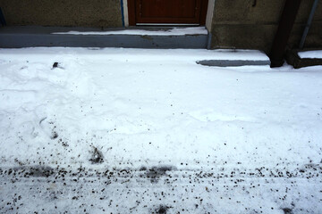 Snow in front of the front door