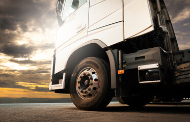 Semi truck parked at sunset sky. Industry freight truck transportation.	
