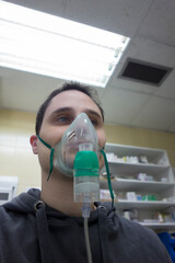 young boy with oxygen mask
