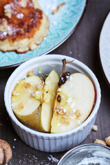 Apple baked with honey and muesli.