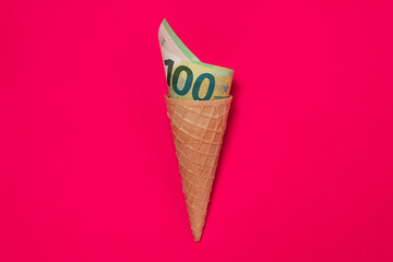 Euro bill rolled in ice cream cone