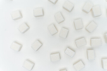 Fototapeta na wymiar sugar cubes on a light background Glucose ingredient