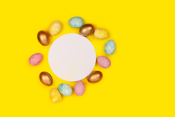 Easter eggs making a frame around a copyspace