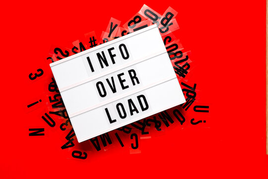 Infromation overload concept. Lightbox on bright red abstract background. Top horizontal view copyspace