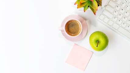 Healthy snack and lunch with working in office.  Top view Green apple with back coffee pink cup for...