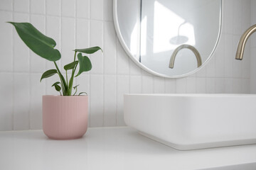 Modern white tiled bathroom