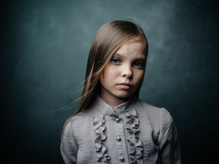 vintage portrait of a beautiful girl in a dress close-up cropped view