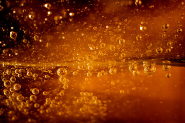 Oxygen bubbles in skin care product, close-up. Hyaluronic acid or shower gel enriched with oxygen....