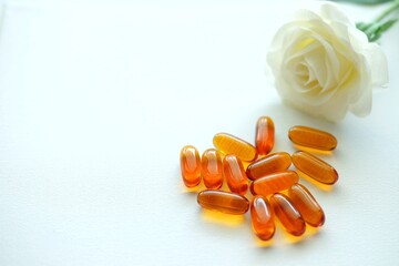 Close up of vitamins on white background