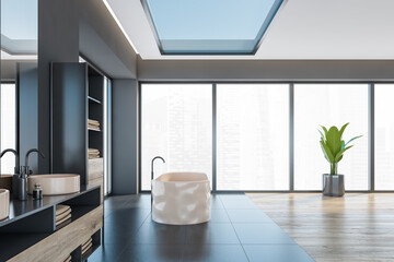Black and wooden bathroom with bathtub and two sinks near window