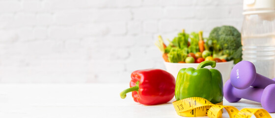 Diet Health food and lifestyle health concept. Sport exercise equipment workout and gym...