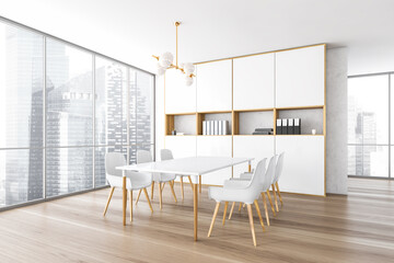 White and wooden office room with table and chairs near window on parquet