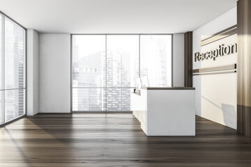 Wooden reception room with desk and computers near window