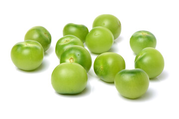 Green tomatoes on white background