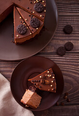 chocolate cheese cake on the wooden table. Top view.