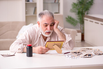 Old sick man suffering at home
