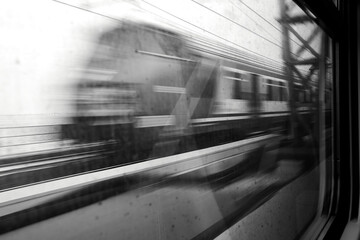 moving train seen from the window of another train
