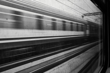 moving train seen from the window of another train