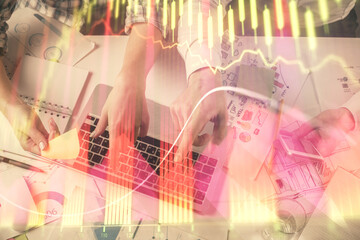 Multi exposure of man and woman working together and forex graph hologram drawing. Financial analysis concept. Computer background. Top View.