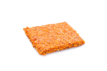 Handmade tomato crispbread white isolated
