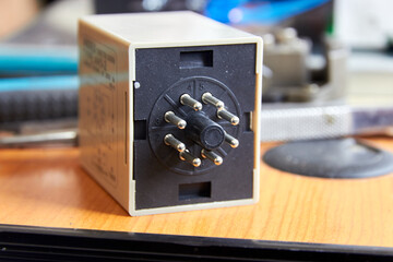 close-up of contacts of electrical analog timer for control cabinet
