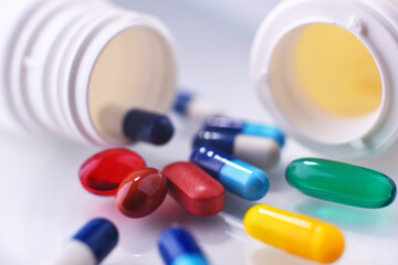 Composition with variety of drug pills and container