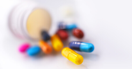 Composition with variety of drug pills and container