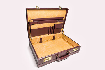 Open and empty 24 hour briefcase on white background