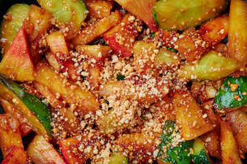 Penang Rojak close up. Malaysian or indonesian cuisine fruits and vegetables salad dish. Asian Food.