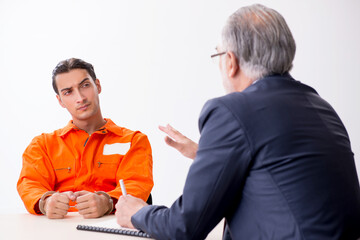 Young captive meeting with advocate in pre-trial detention