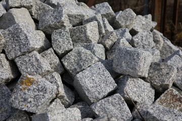 A pile of granite stones for construction.