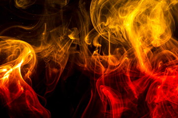 Fototapeta premium Colored smoke on black background